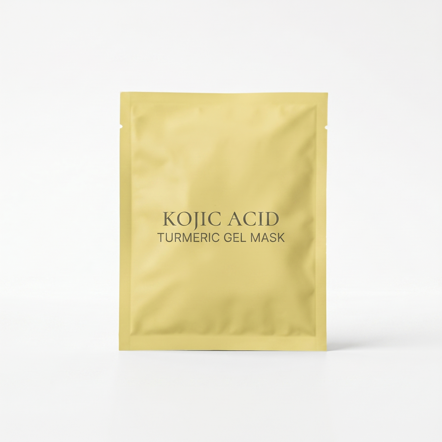 Masque acide kojique & curcuma — packshot studio fond blanc