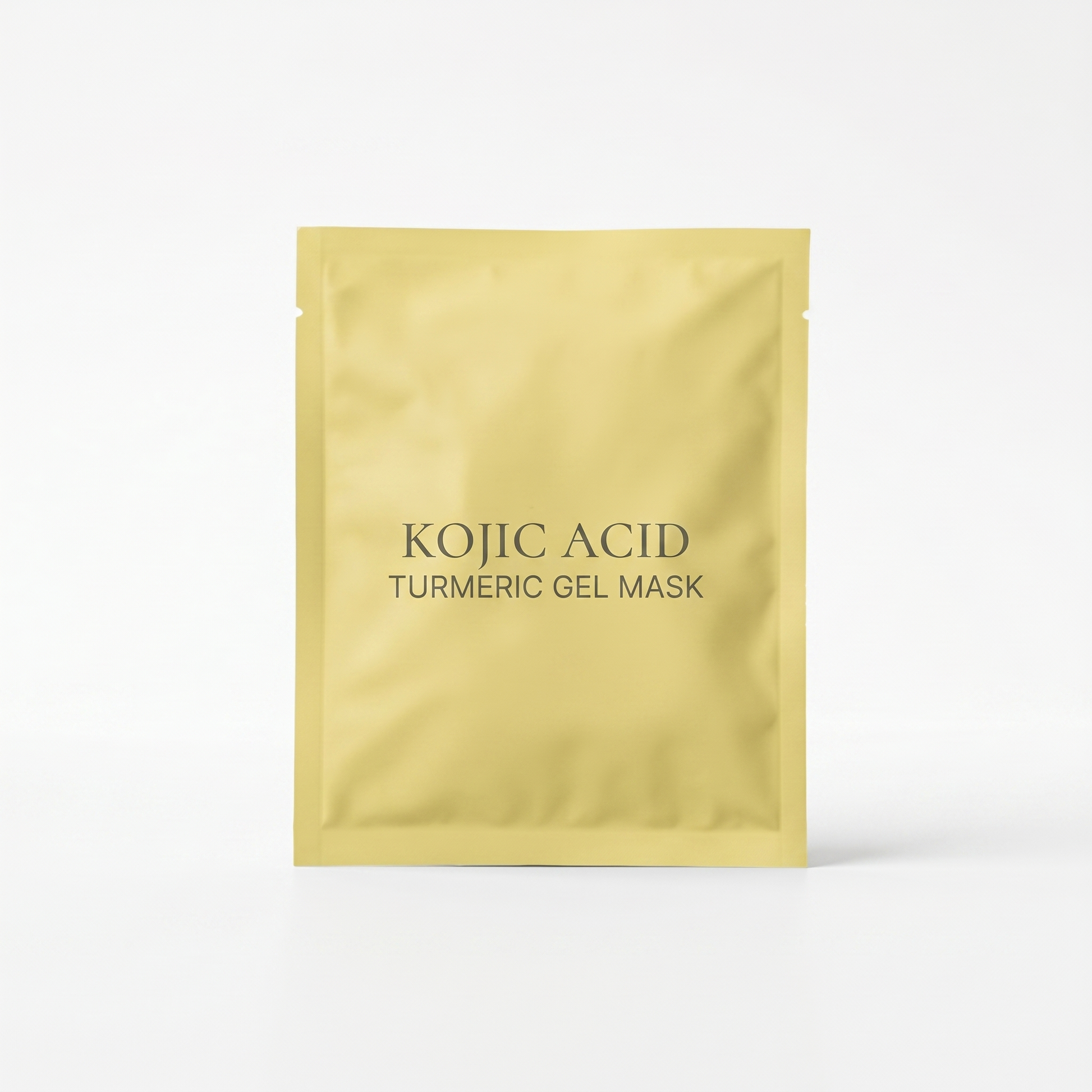 Masque acide kojique & curcuma — packshot studio fond blanc